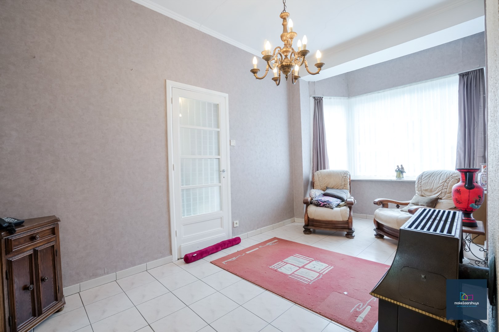 Centraal gelegen te renoveren woning in rij met tuin te Mariakerke 