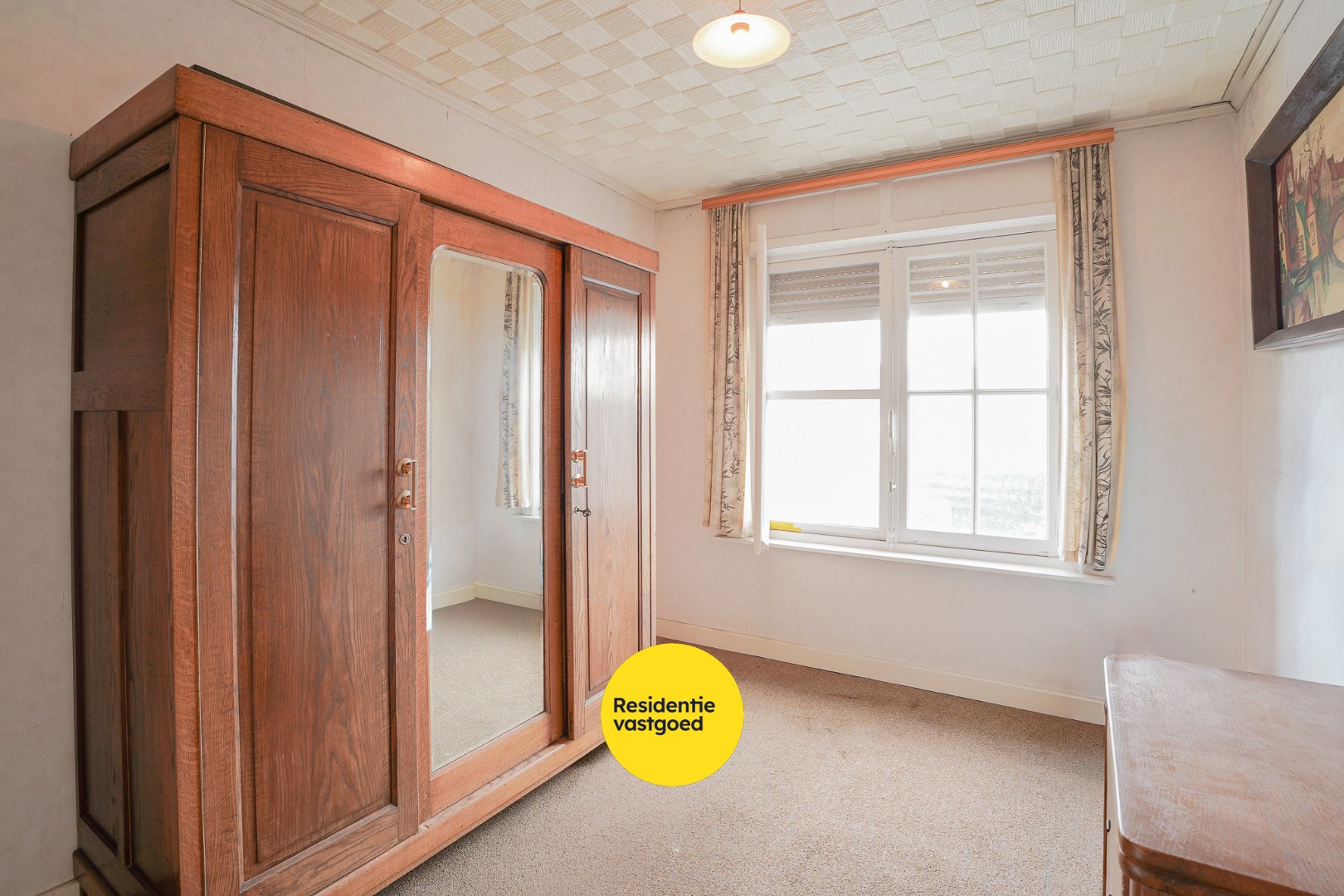 Ruime woning met zuidgerichte tuin te Sint-Michiels 