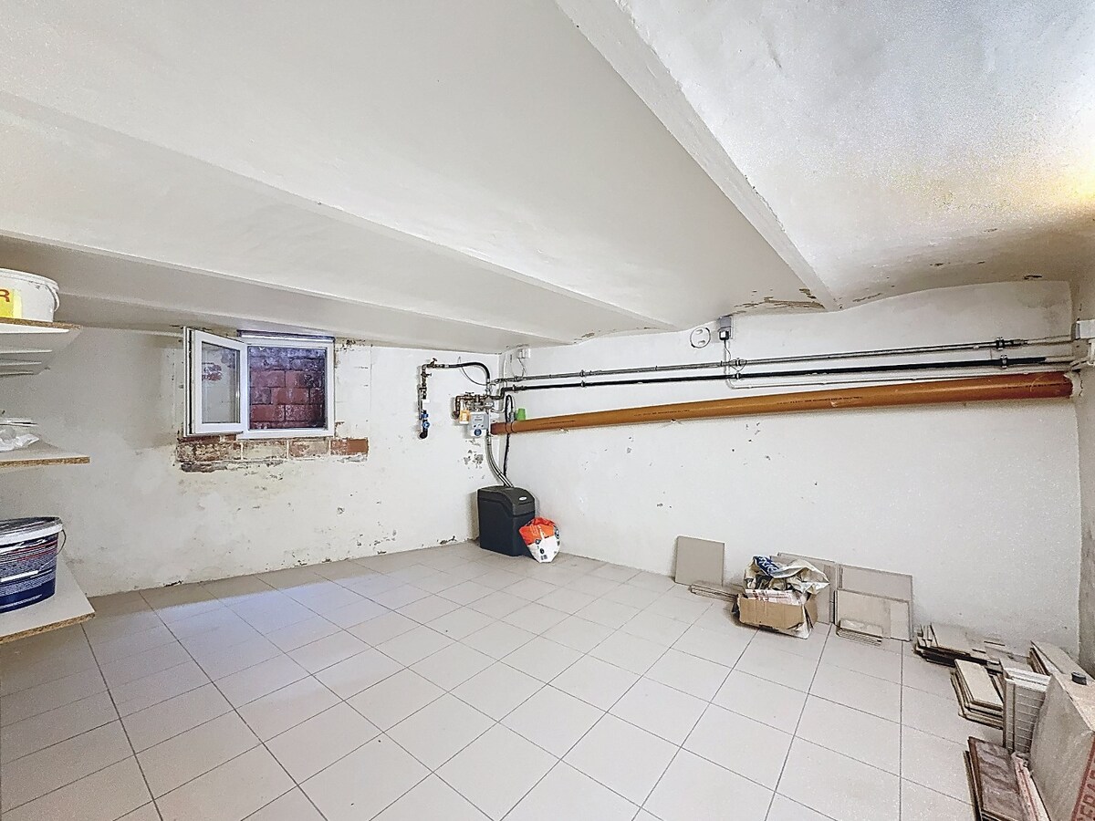 Ruime, instapklare woning met tuin te centrum Zottegem 