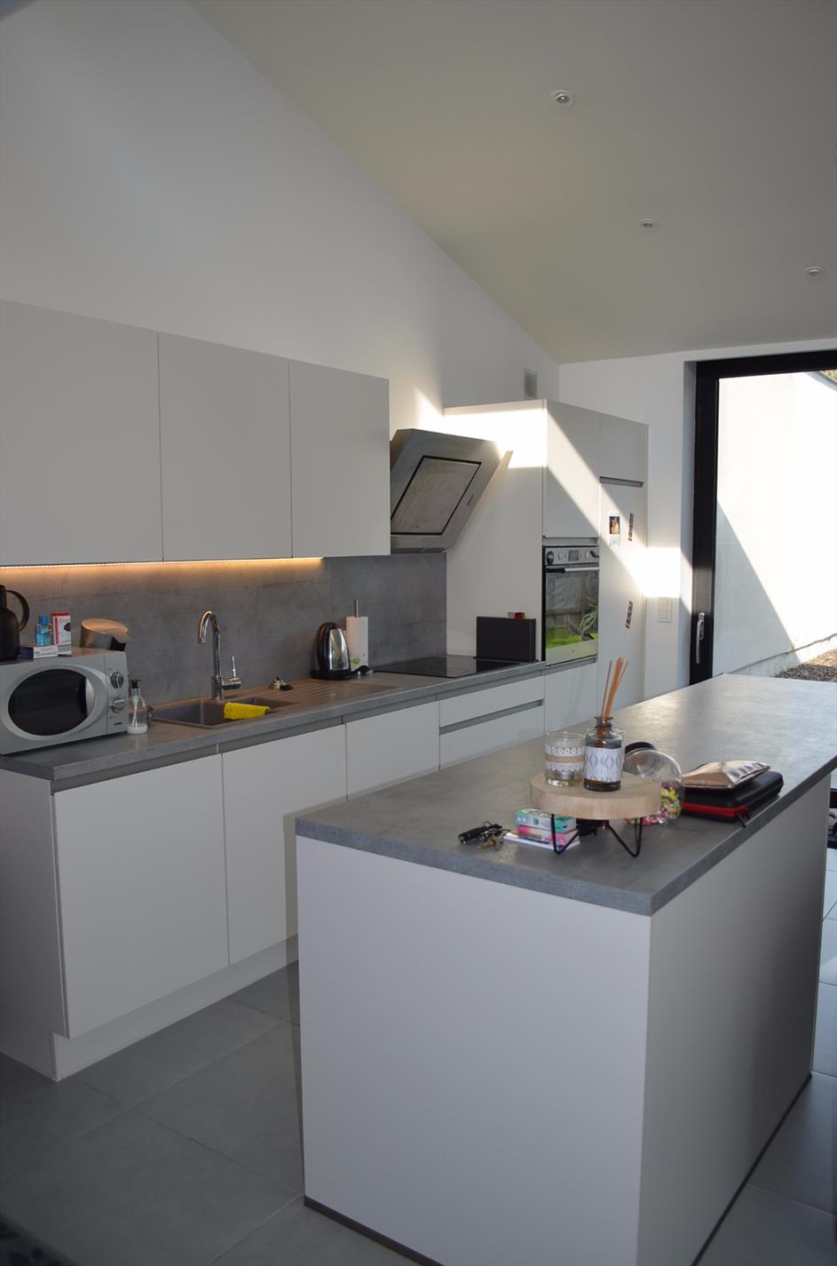 Nieuwbouw woning met 2 slpks, carport en tuin te centrum Maldegem 