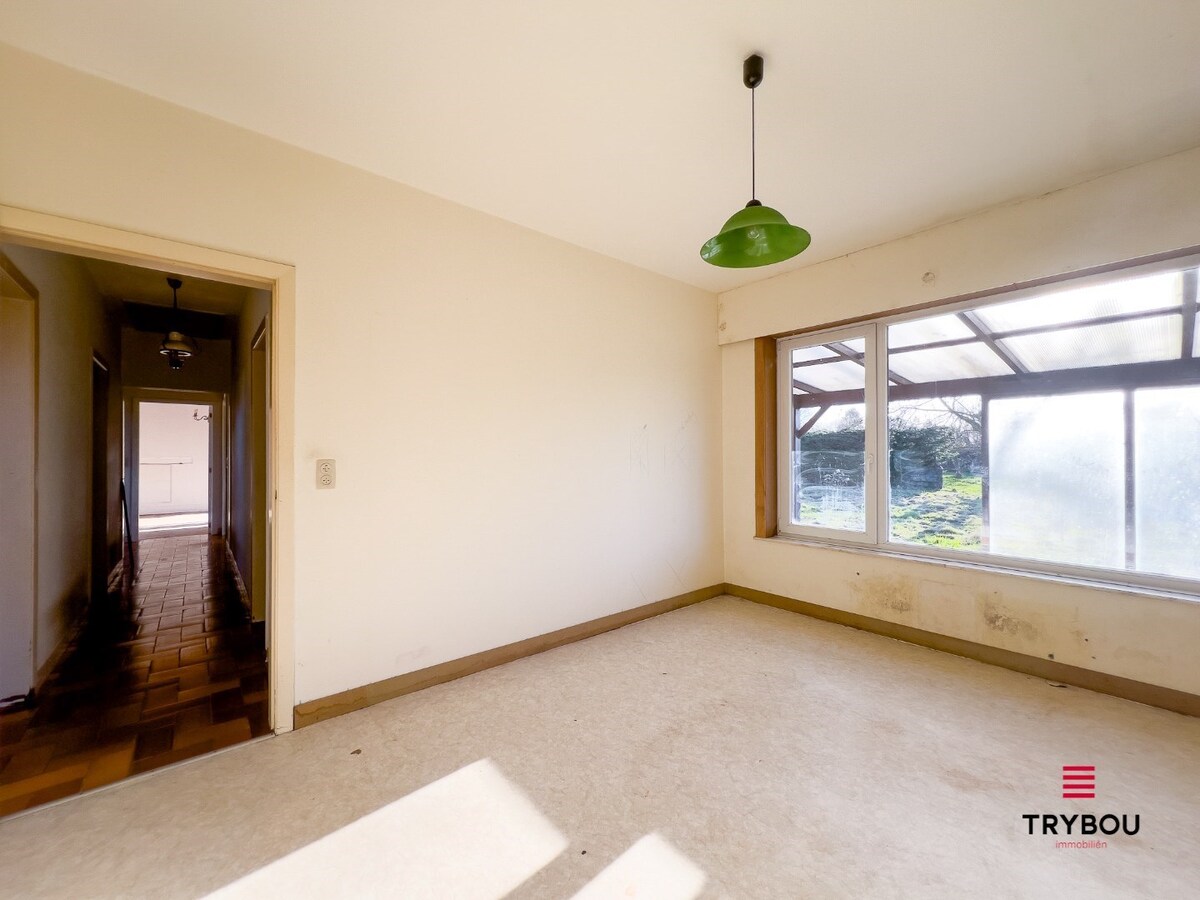 Te renoveren woning met bijgebouw op ruime perceel van 1273m² 