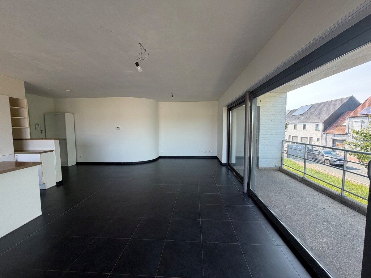 2 slpk-appartement nabij allerhande voorzieningen. 