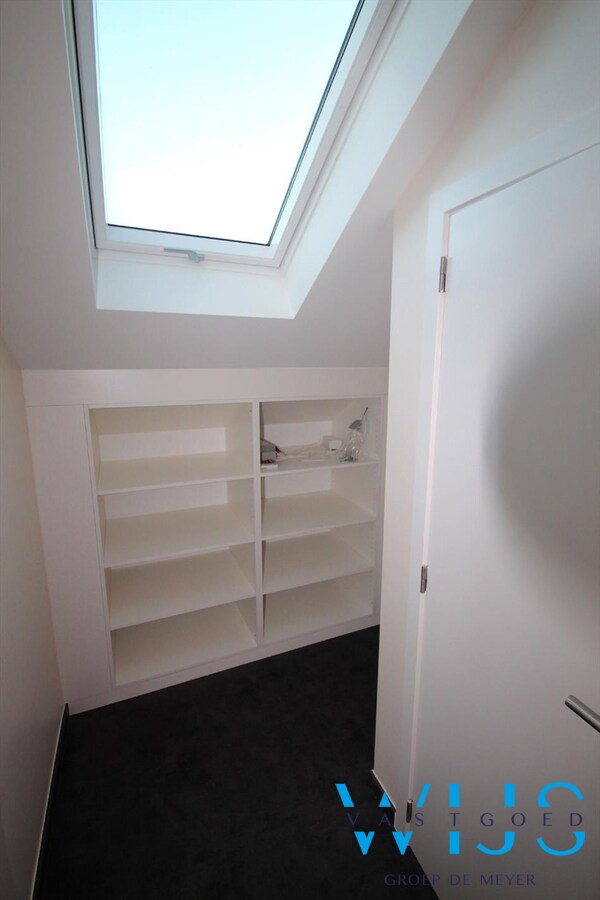 Uniek dakappartement te CENTRUM EVERGEM ! 