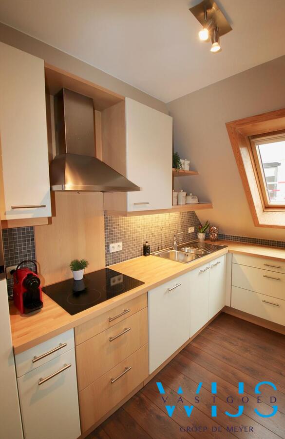 Charmant instapklaar tweeslaapkamer appartement in centrum Ertvelde! 