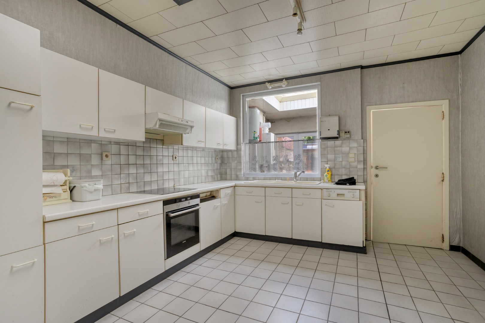 Centraal gelegen rijwoning in Kessel-Lo met parking - EPC 246 kwh/m² 