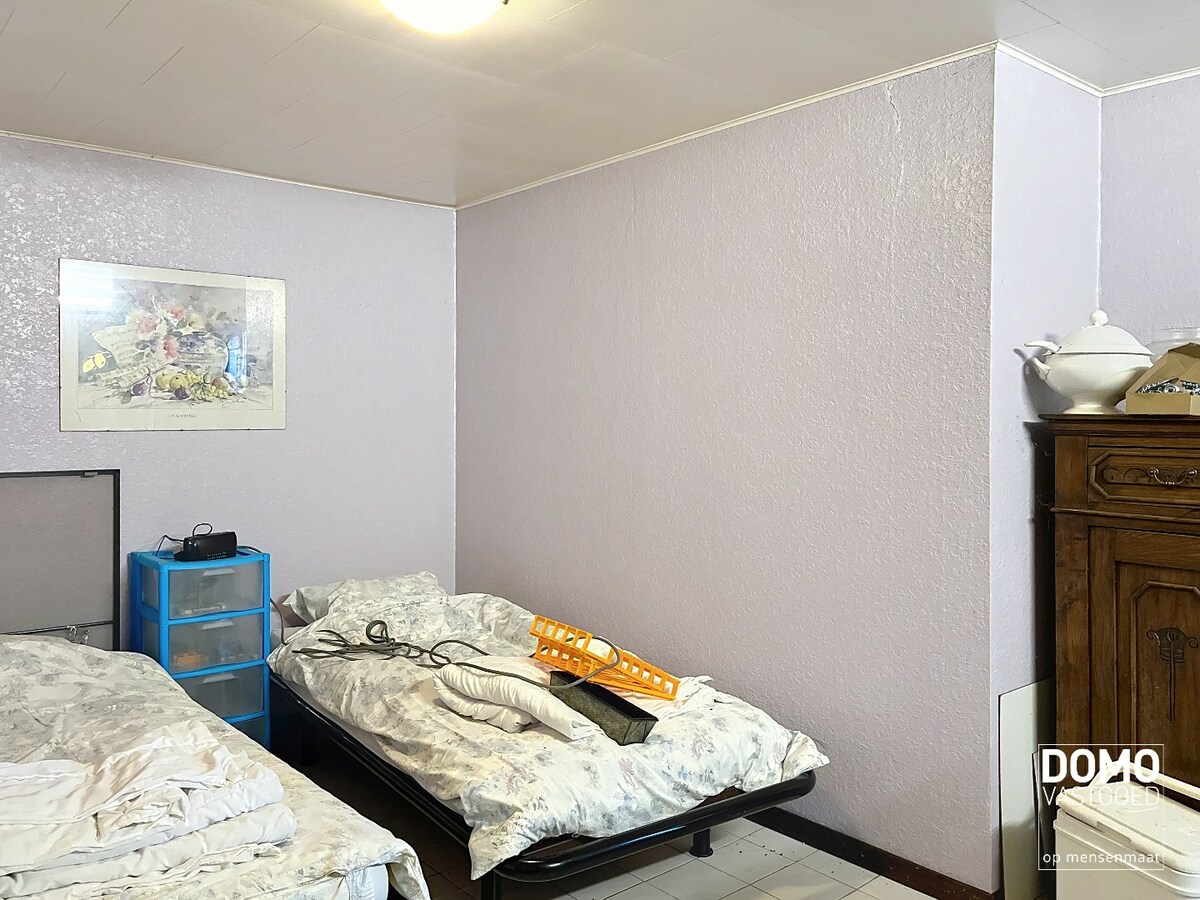 Halfopen bebouwing met tuin te Herk-de-Stad 