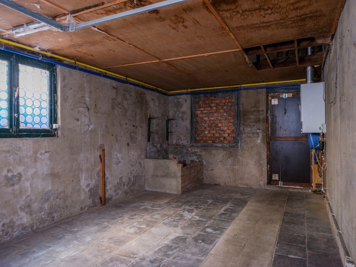 Half-open op te frissen woning met 3 slaapkamers te Gistel 