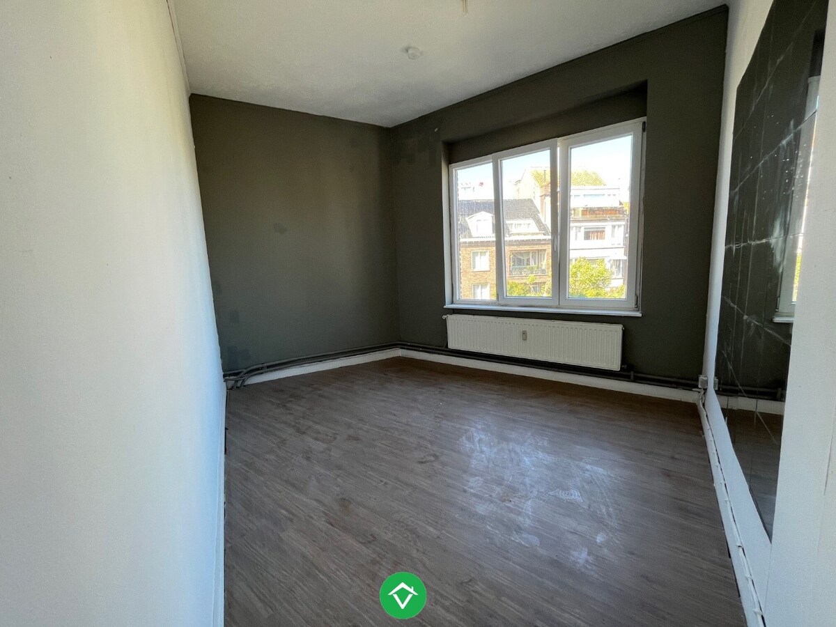 Opbrengstpand bestaande uit 3 verhuurde appartementen, gelegen aan H.Hart-Kerk 