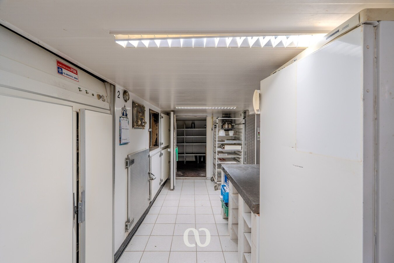 Handelspand met woonst en mogelijkheden in centrum Gavere 