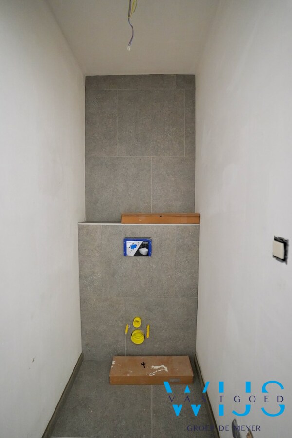 Drieslaapkamer appartement met garage in hartje Ertvelde ! 