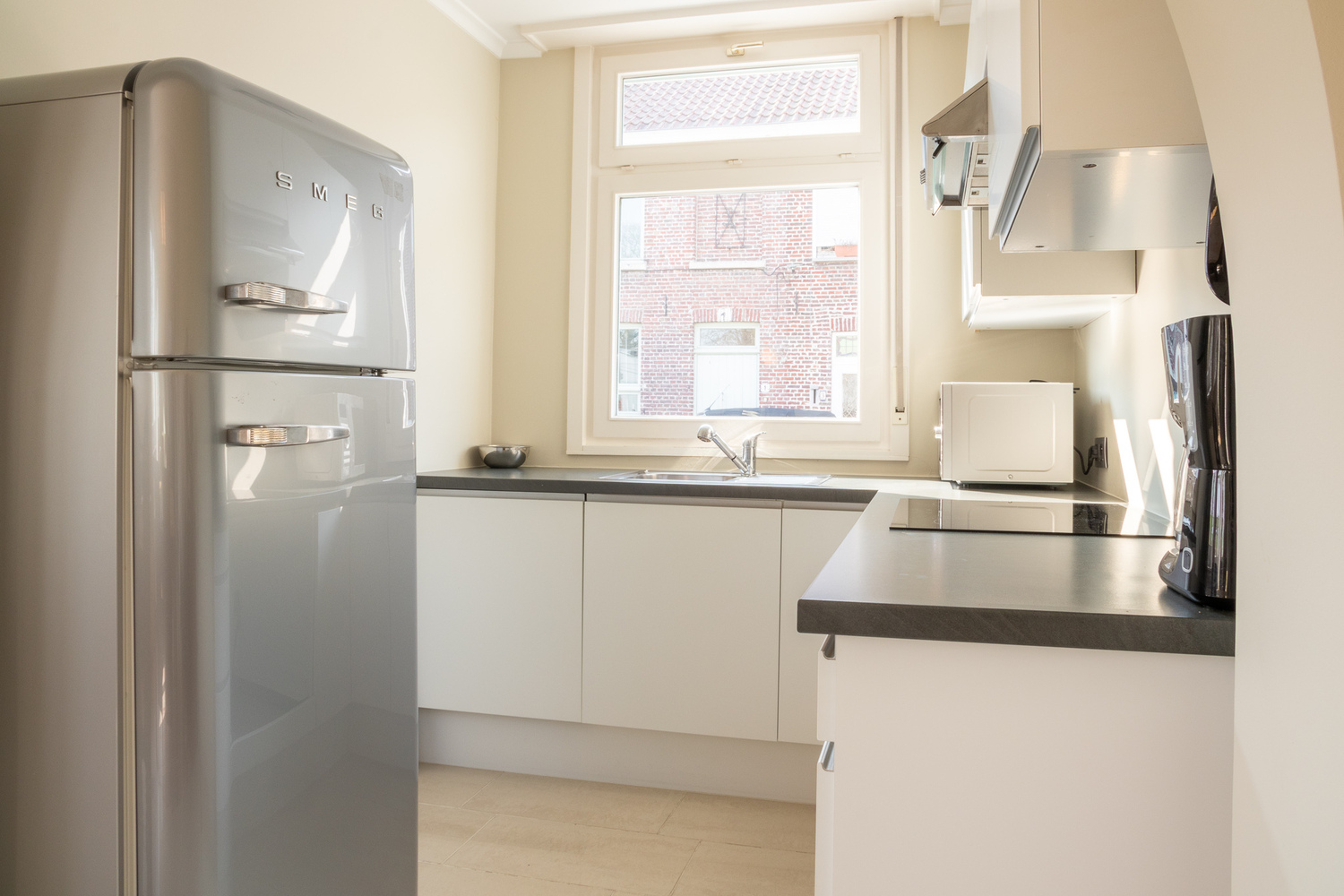 Subliem gelegen en knap gerenoveerd huis in het Sint-Annakwartier 