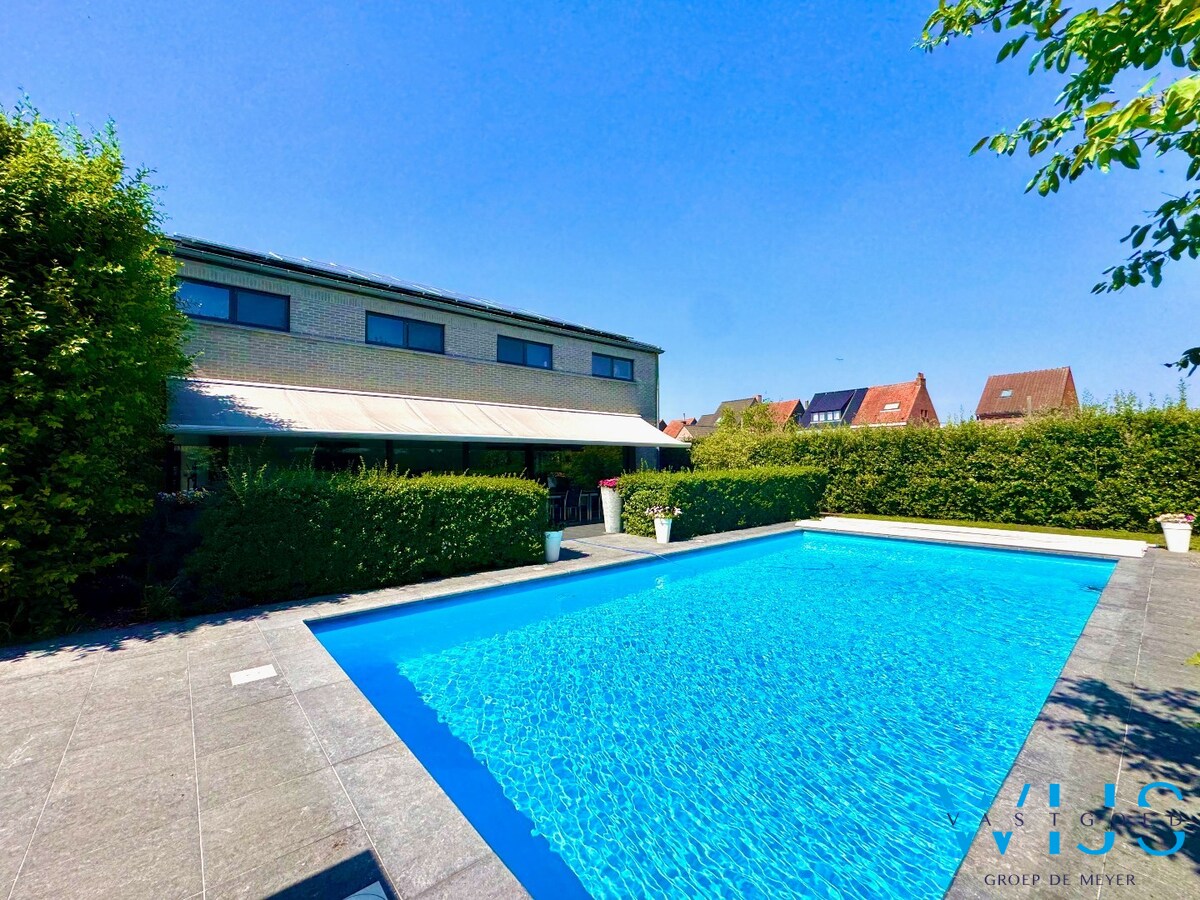 Instapklare open bebouwing met verwarmd zwembad op toplocatie in Sleidinge 