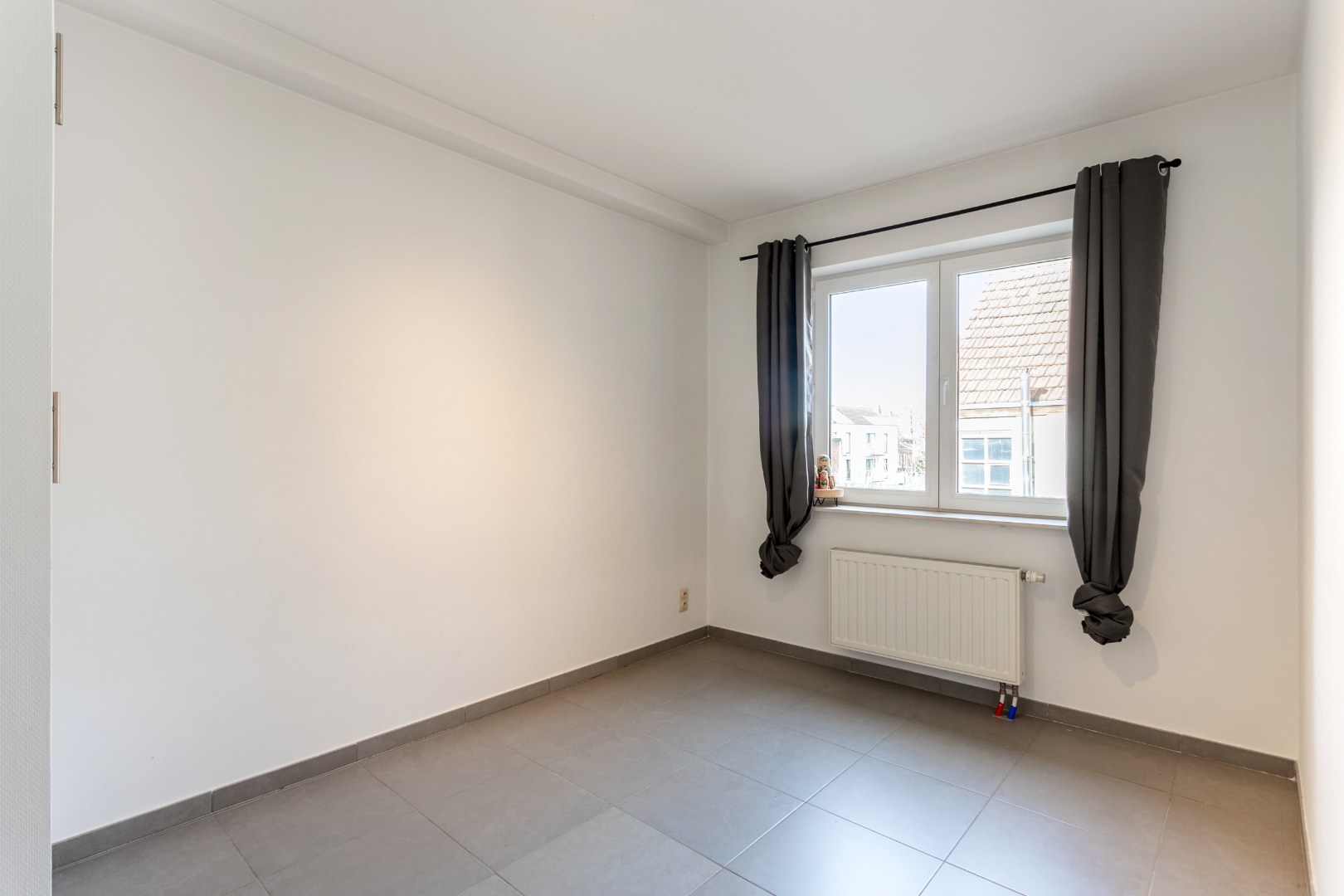 Handelspand met woonst te Halle centrum 