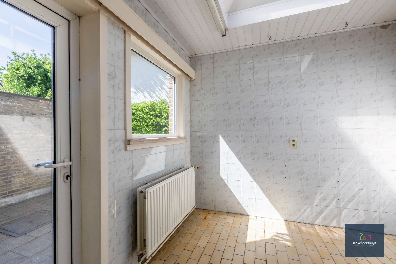 Centraal gelegen halfopen bebouwing met stadskoer 