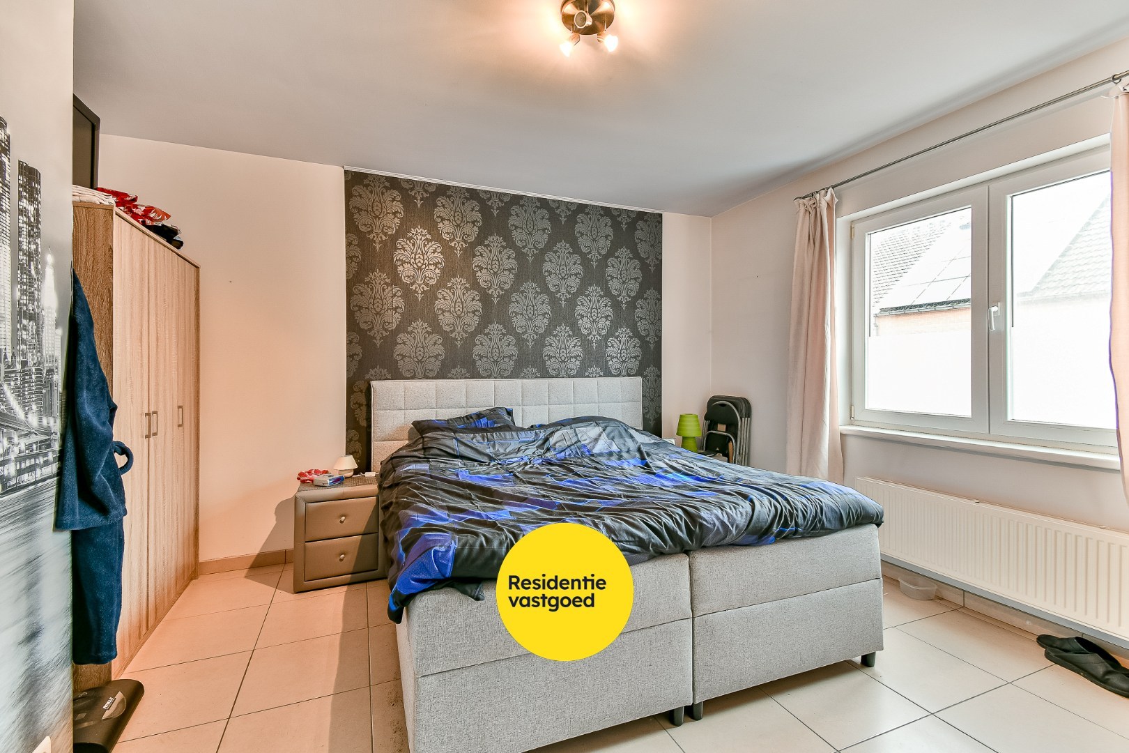 Opbrengsteigendom met 3 appartementen en 3 garages 