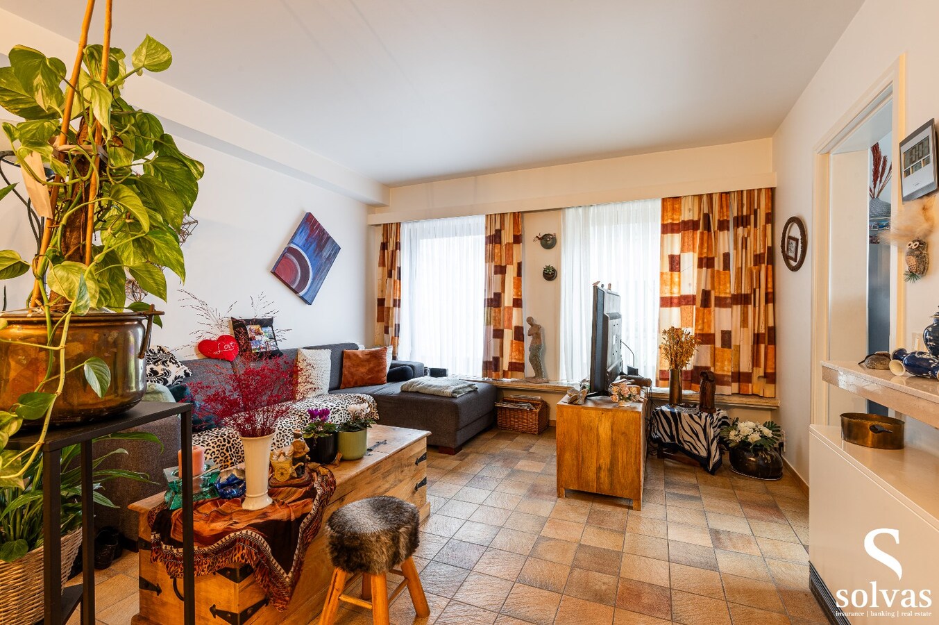 Gebouw met 4 appartementen en 2 handelspanden in centrum Maldegem 