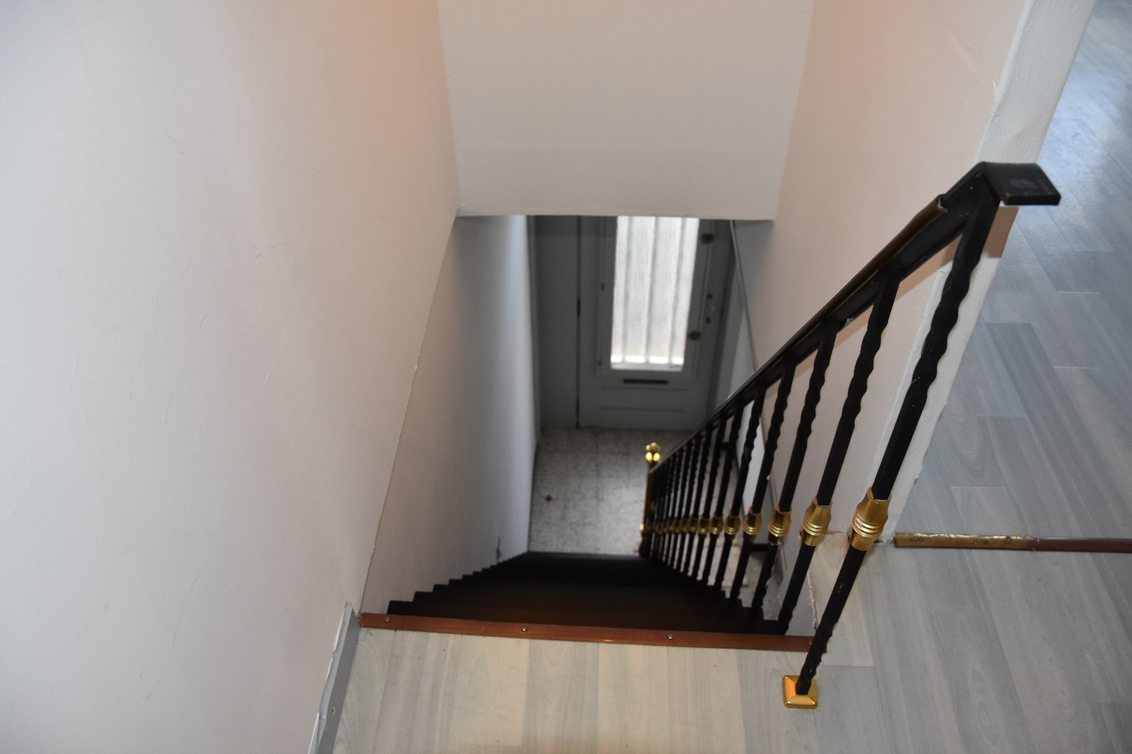 Opgefriste rijwoning met stadskoertje 