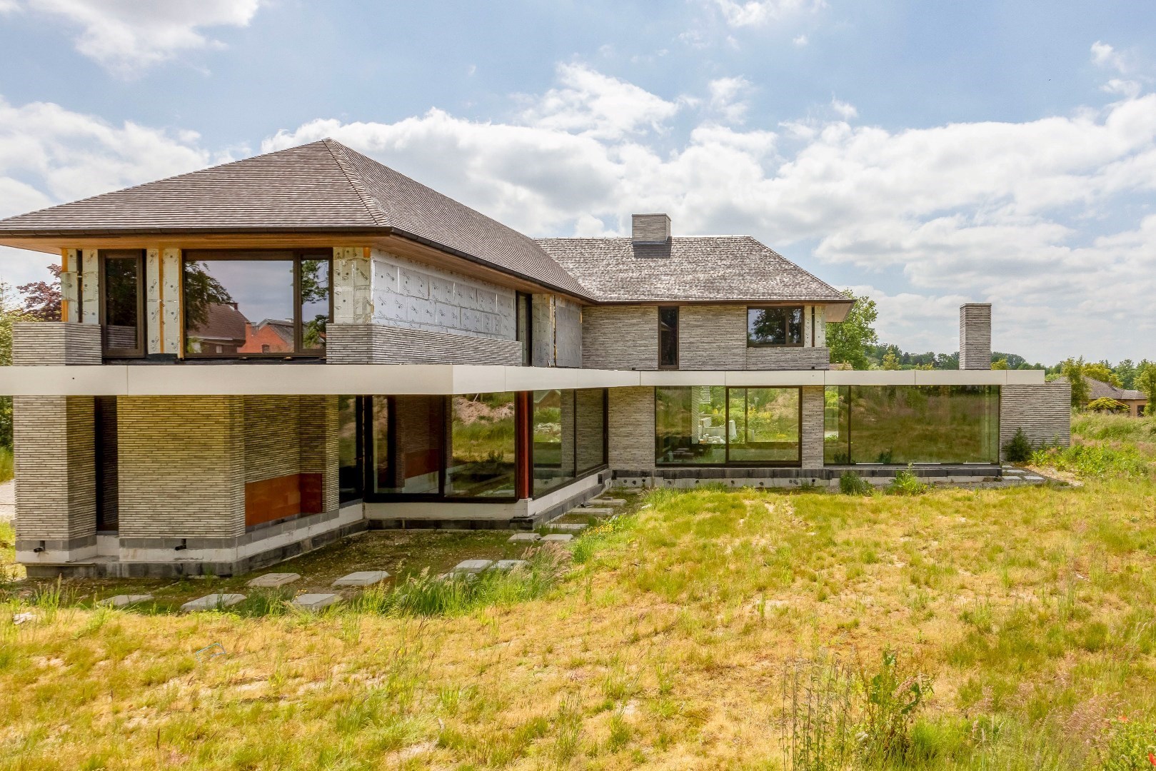 Unieke kans : exclusieve  riante villa  1400m²  by Artea en Piet Bailyu Architects 
