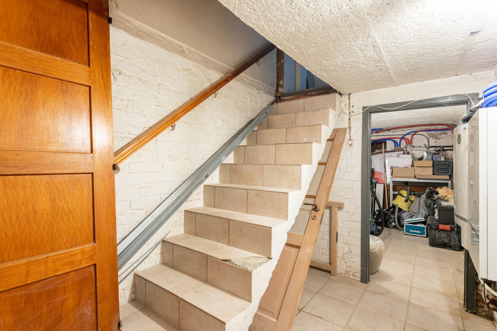 Rustig gelegen halfopen woning met 3 slpks en tuin te Buizingen 