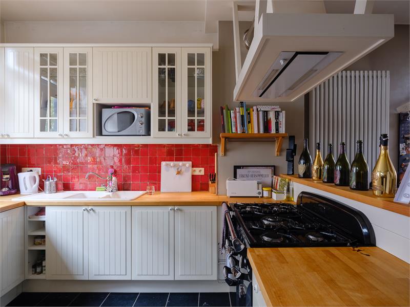 Uniek gerenoveerde woning in levendige buurt 