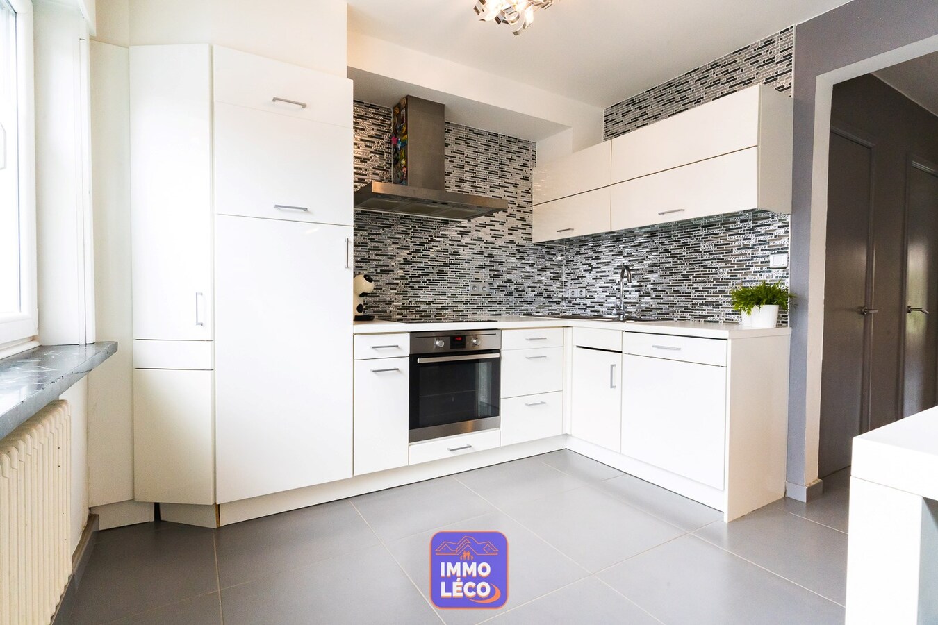 3 façades rénovée avec garage et jardin, plein centre-ville ! 