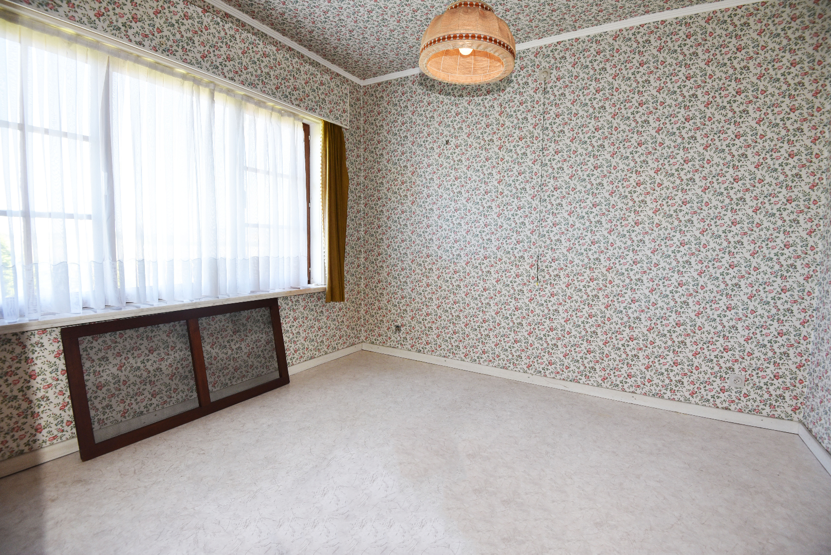 Op te frissen woning op 1.029m² met zicht op de velden te Kaprijke 