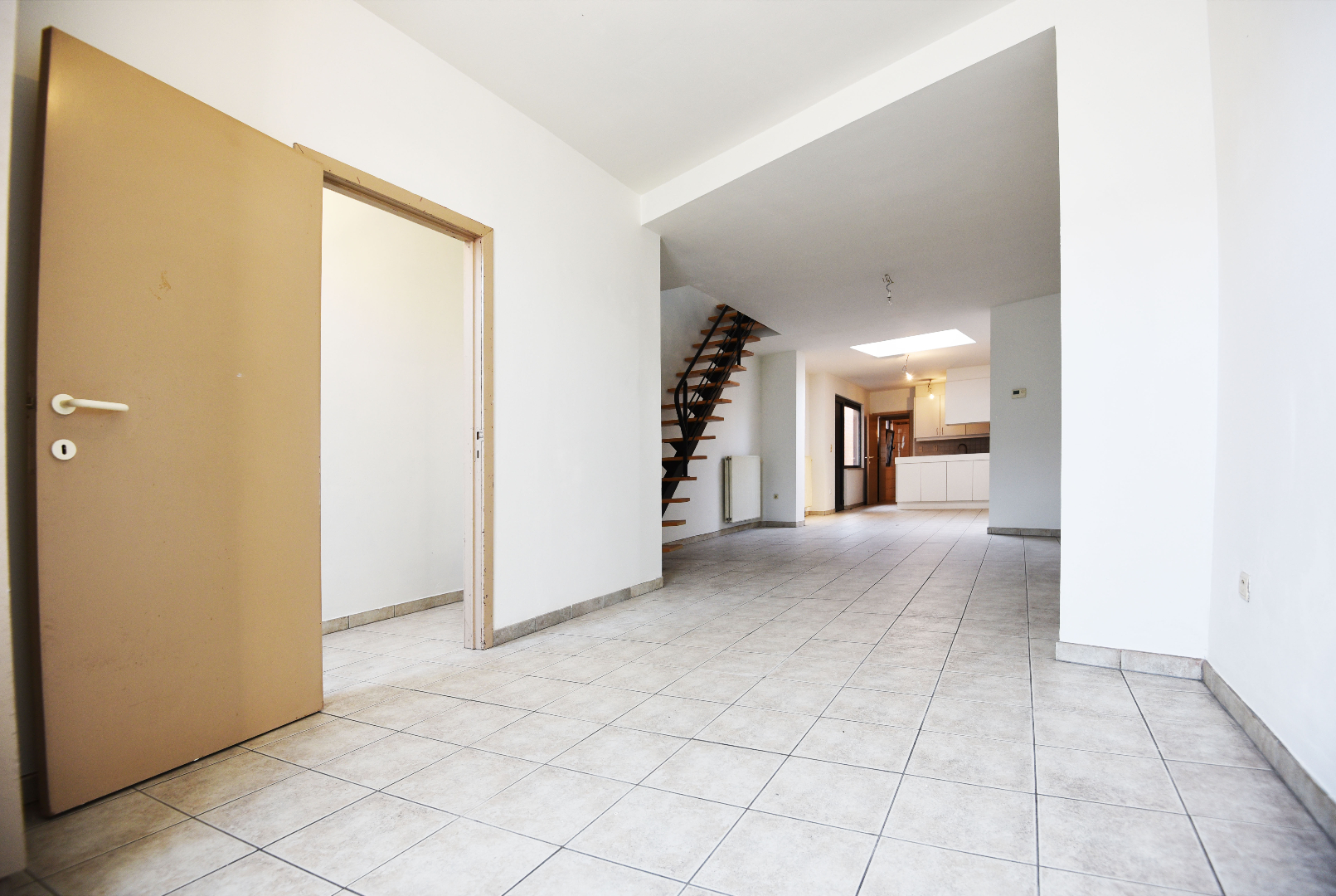 Rijwoning met 2 slpks en tuin te Eeklo 