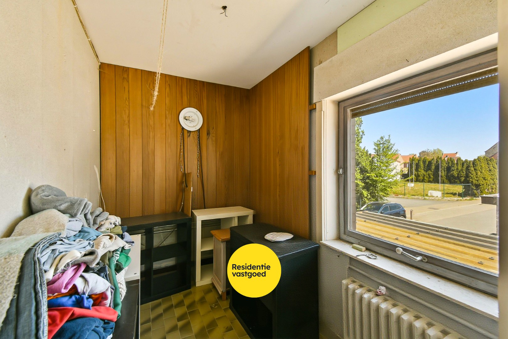 Woning met drie slaapkamers, garage en zonnige tuin 