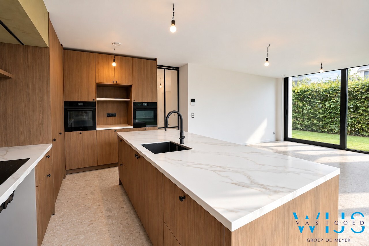 High-end gelijkvloers appartement met tuin te Lembeke ! 