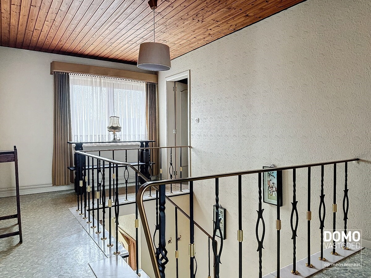 Charmante woning met ruime tuin en inpandige garage, rustig gelegen te Spalbeek. 