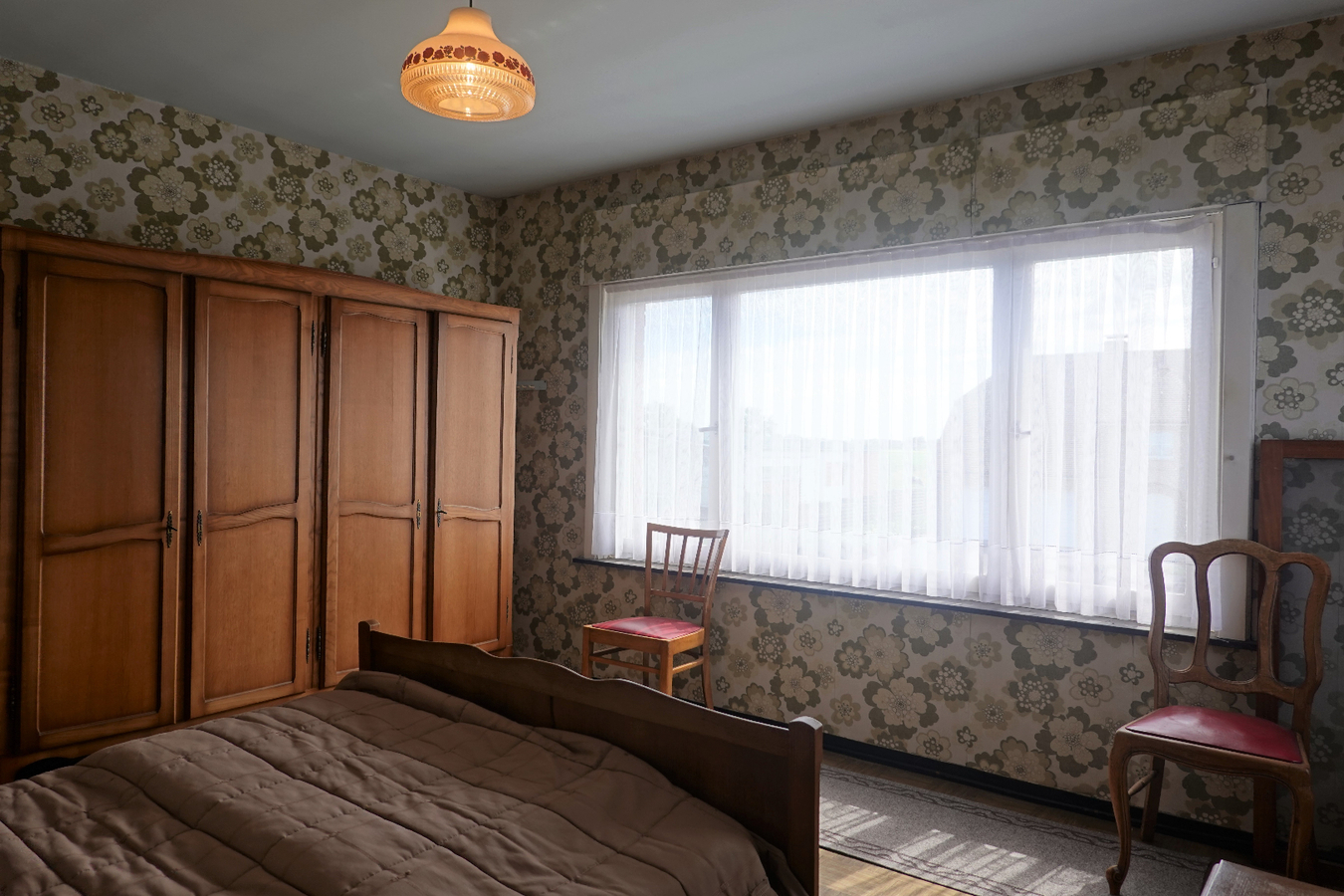 Alleenstaande woning met garage en mooie tuin 