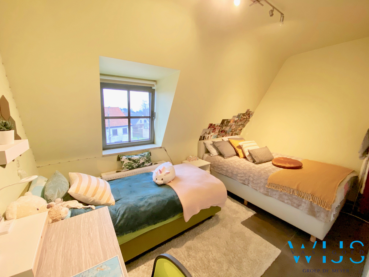 Instapklaar éénslaapkamer appartement MET staanplaats te Evergem/Rieme ! 