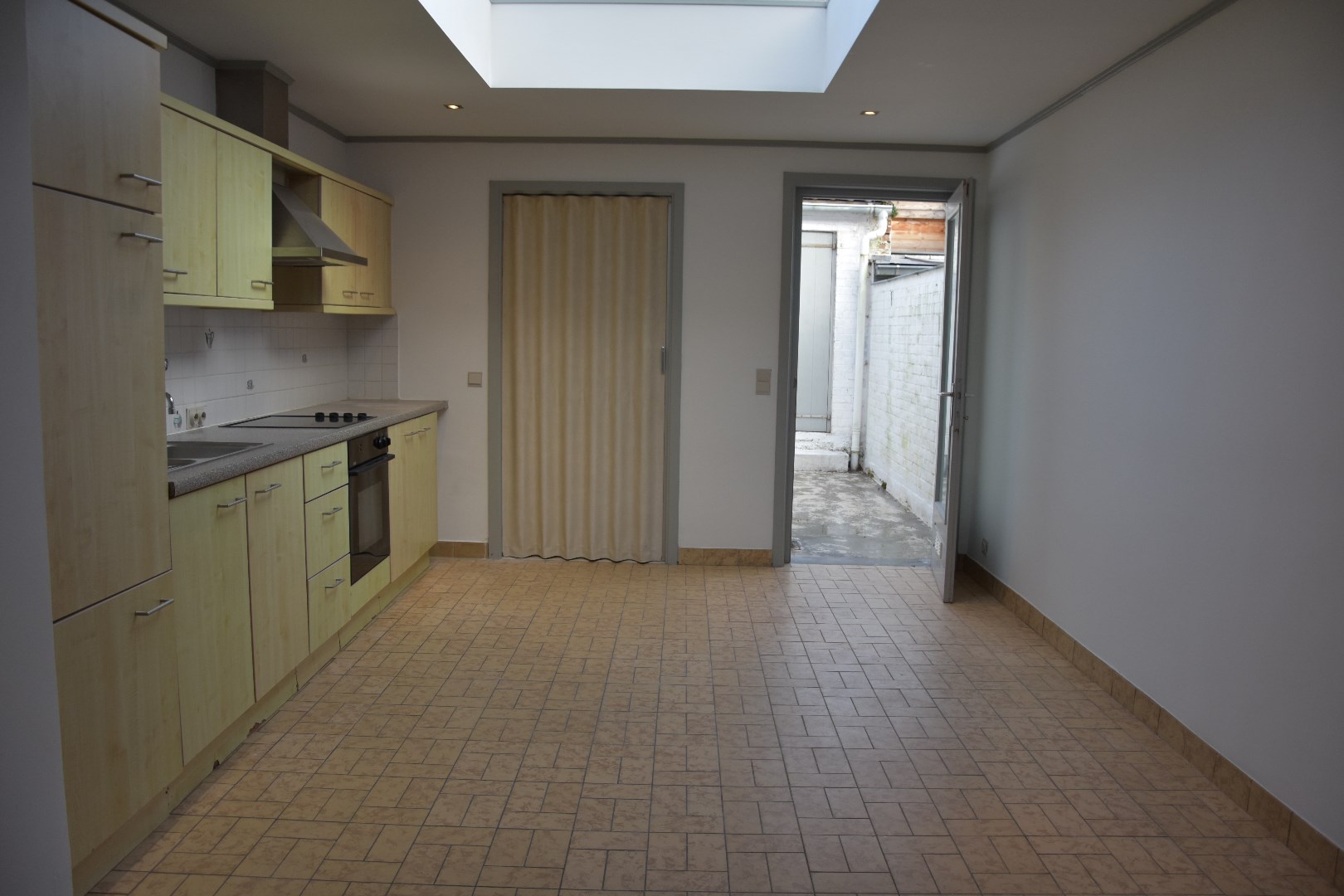 Opgefriste rijwoning met stadskoertje 