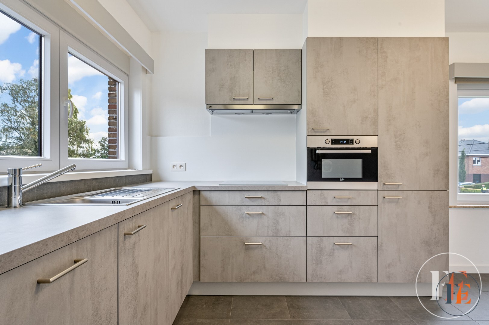 Duplex appartement  met garage en tuin te Drongen 