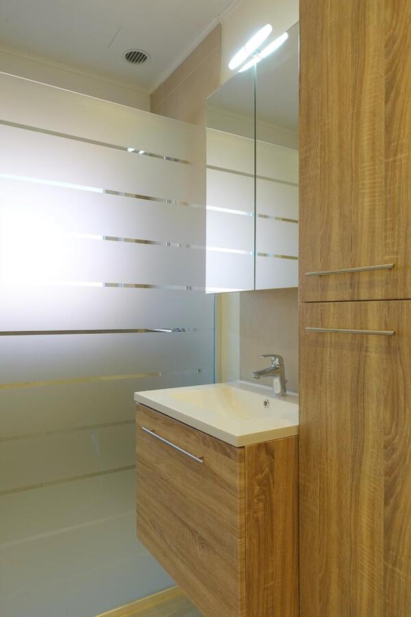 Ruime halfopen bungalow met zongerichte tuin 