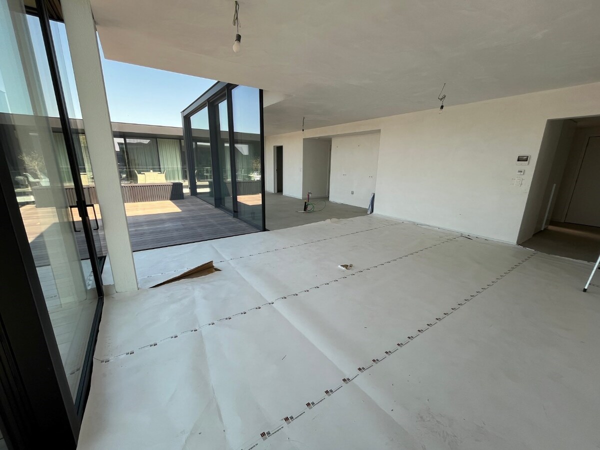 Luxe penthouse in hartje Zingem 