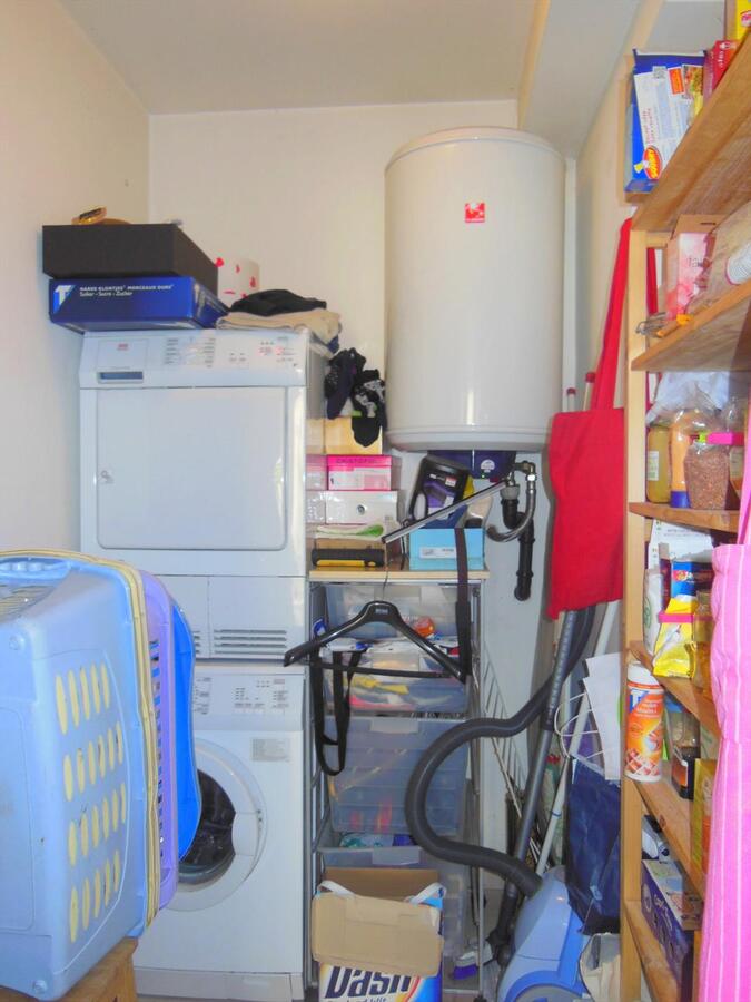 Gezellig gelijkvloersappartement met zonnige tuin en garage 