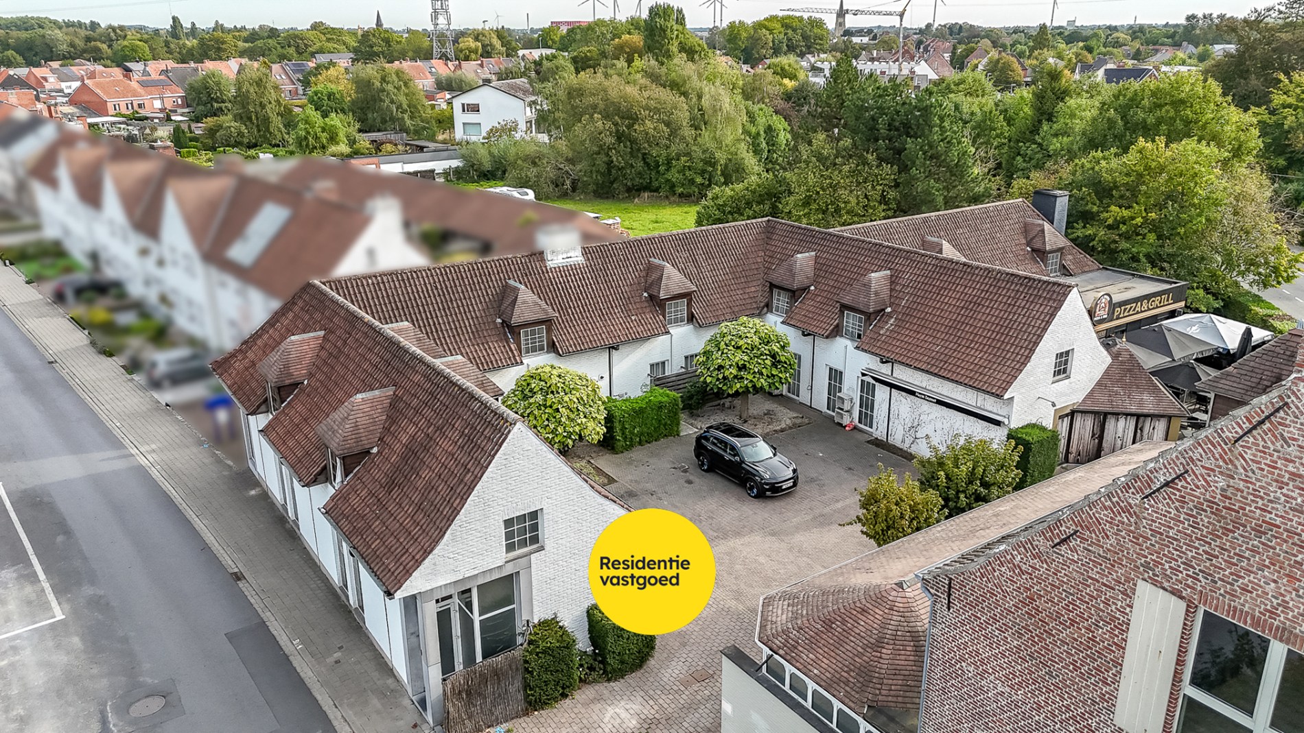 Multifunctionele eigendom met appartementen en handelszaken! 