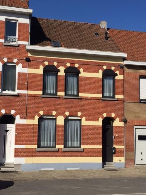 Gezellige, degelijke woning met aangename tuin. 