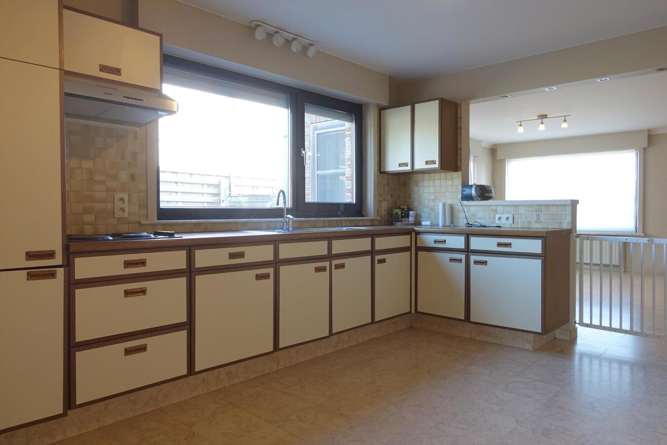 Gezellige half-open woning met zonnige tuin 