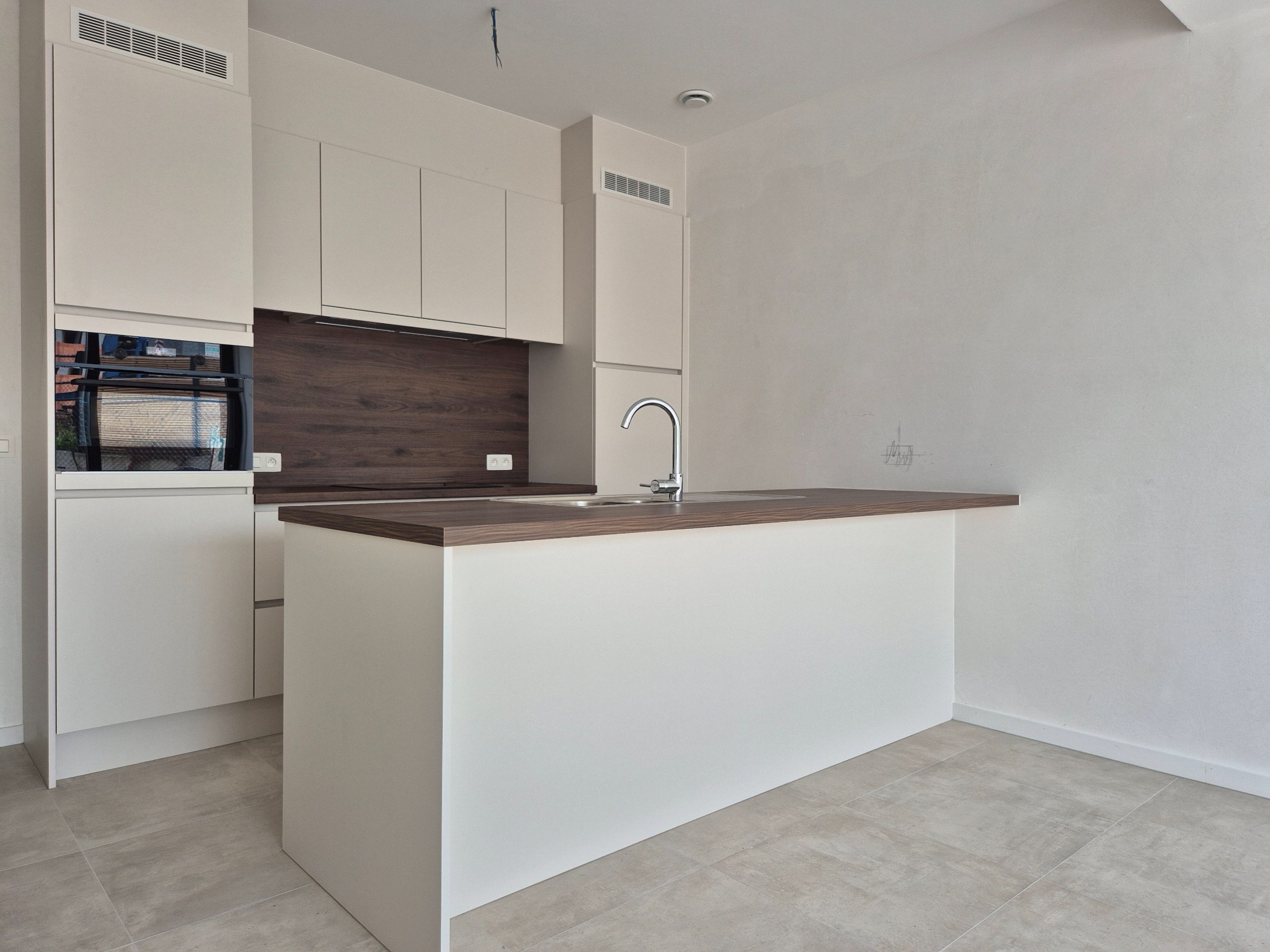 Gelijkvloers appartement met 2 slaapkamers, tuin en terras 