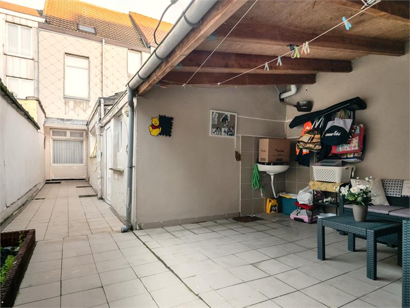 Rijwoning met 4 slaapkamers en ruim terras 