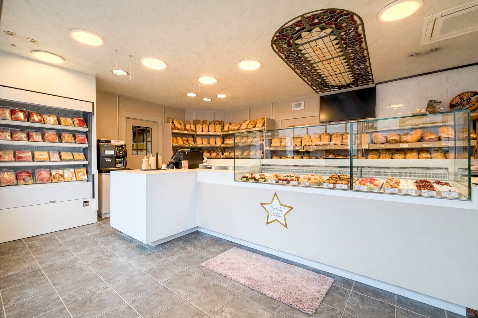 Handelspand bestaande uit winkel met woning, productieatelier en groot magazijn, Torhout 