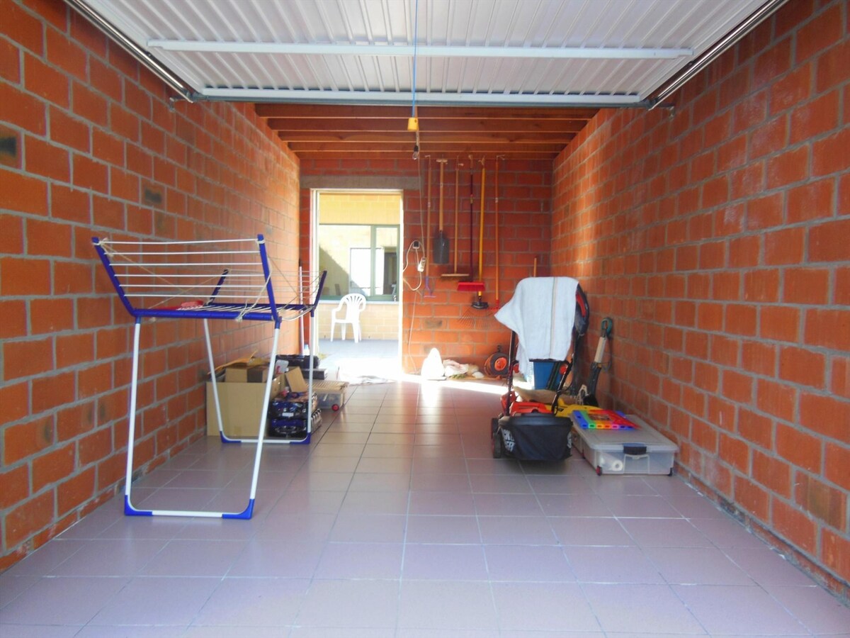 Gezellig gelijkvloersappartement met zonnige tuin en garage 