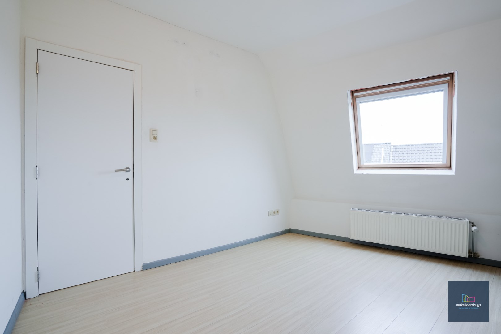 Rustig gelegen dakappartement nabij het centrum van Gentbrugge 