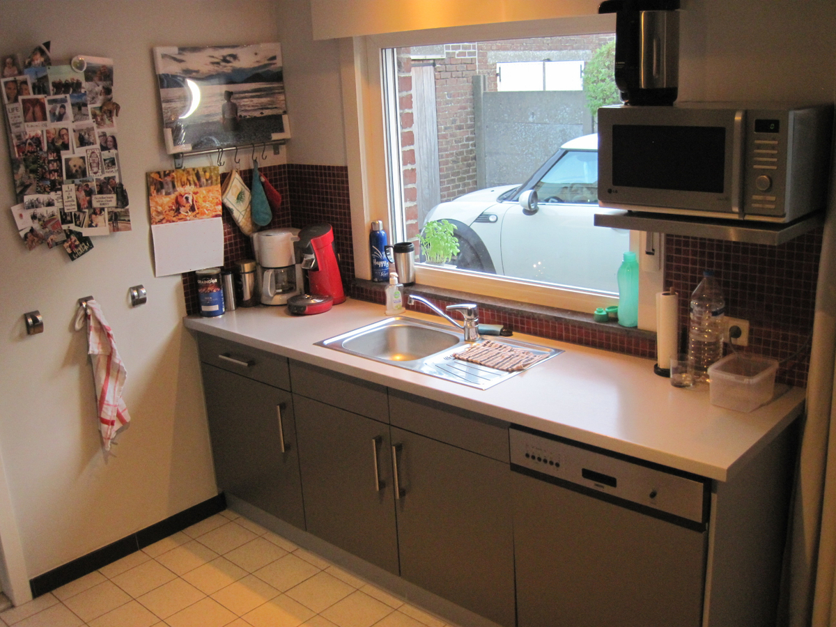 Degelijke én gezellige woning. Met tuin en met garage. 