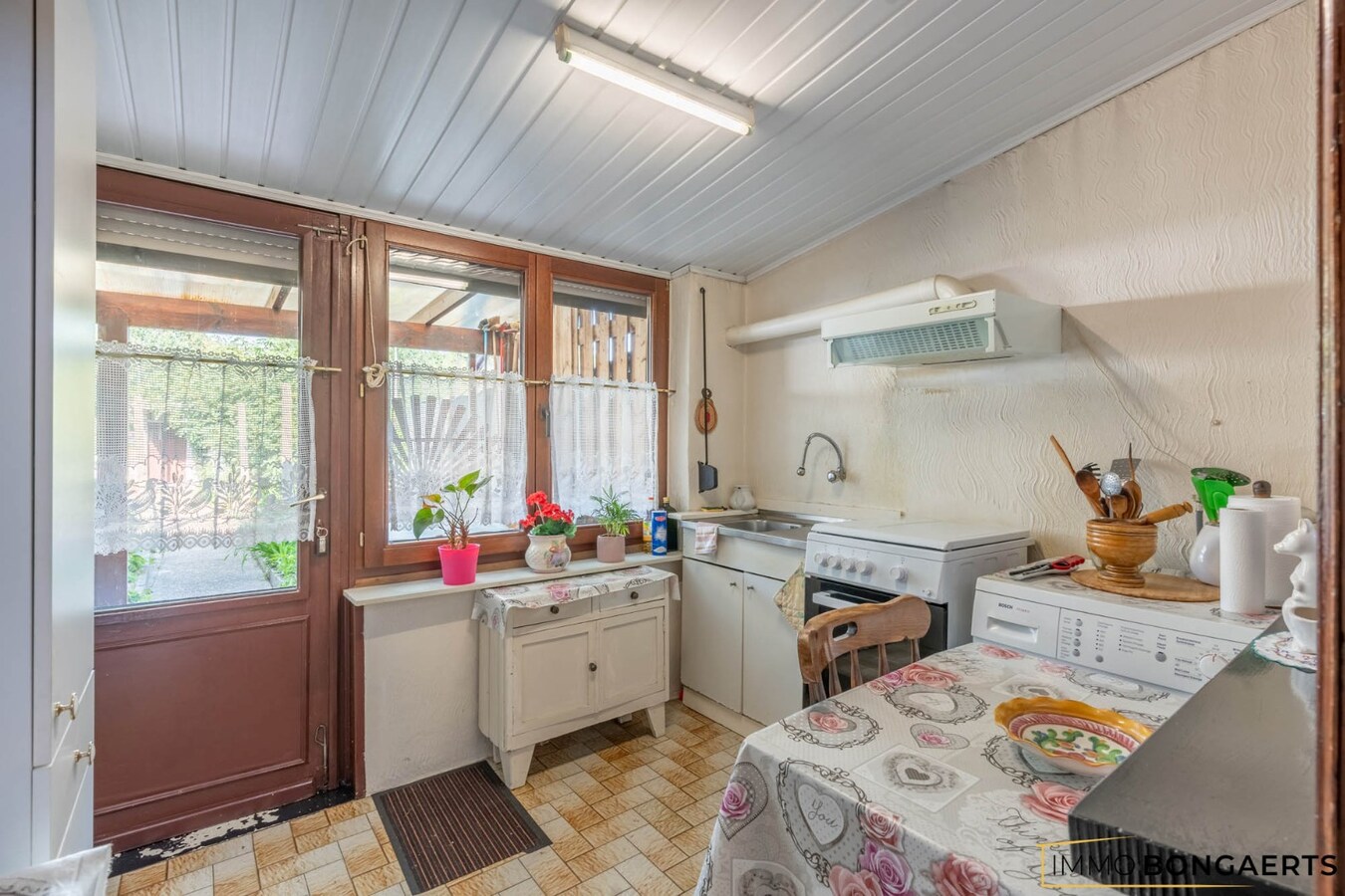 Ruime woning met tuin, garage en 4 slaapkamers. 