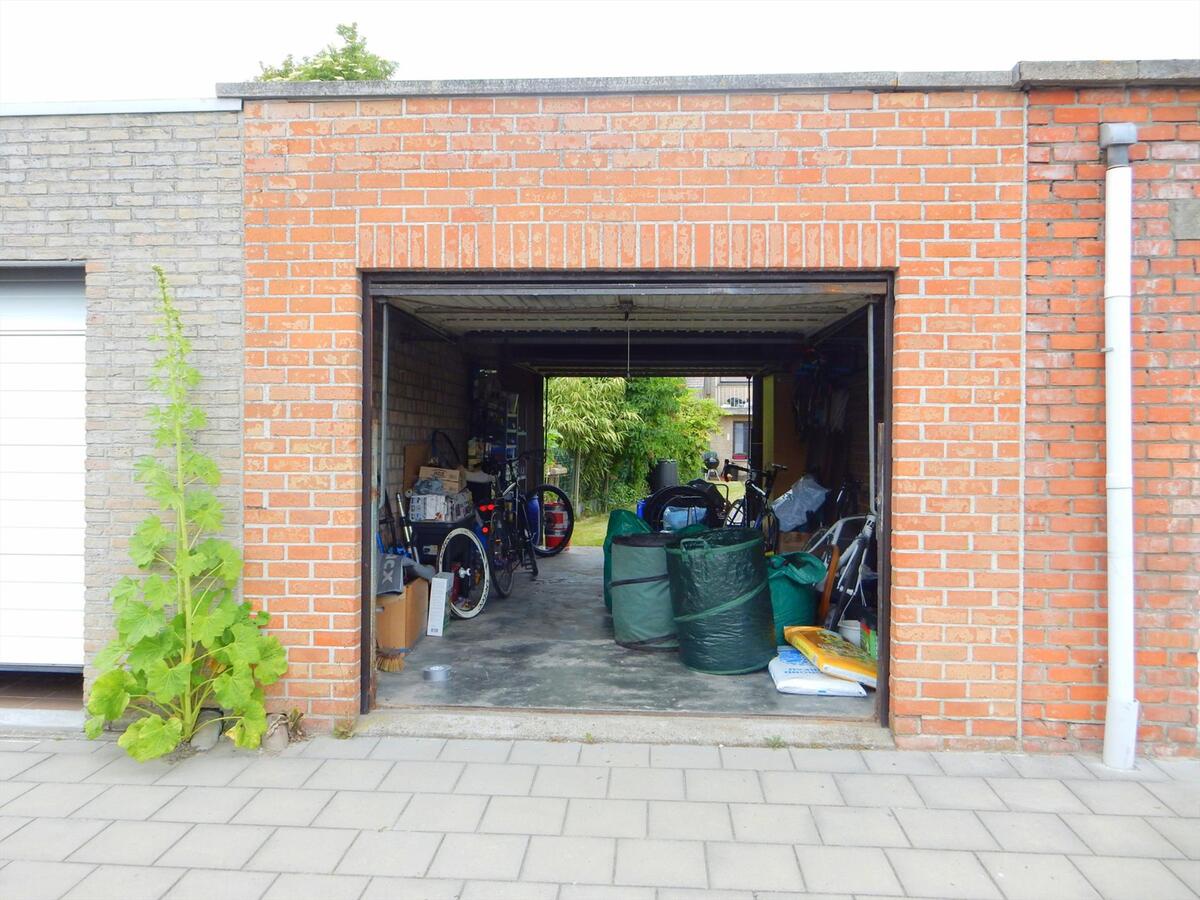 Appartement met garage en grote tuin 