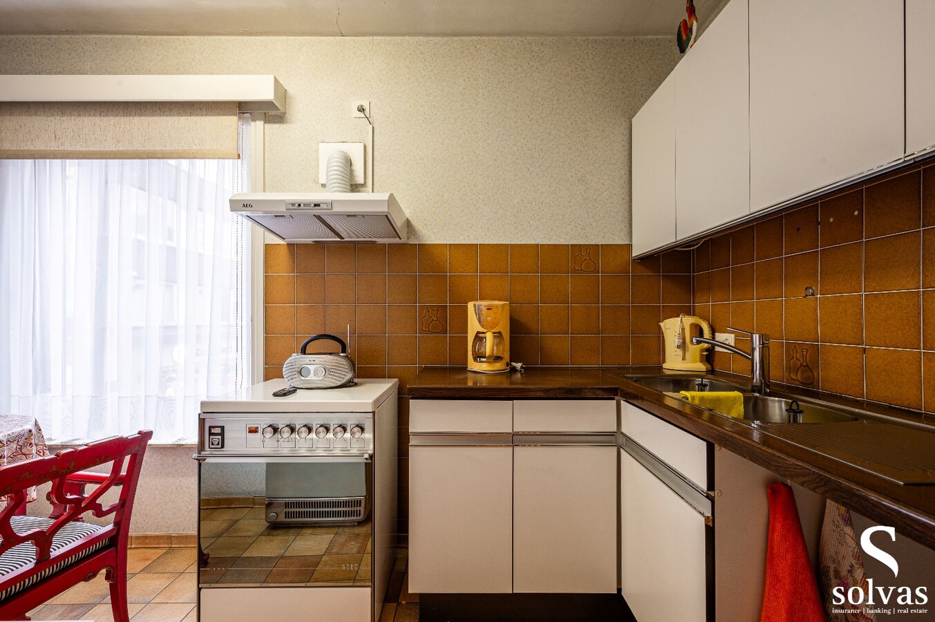 Gebouw met 4 appartementen en 2 handelspanden in centrum Maldegem 