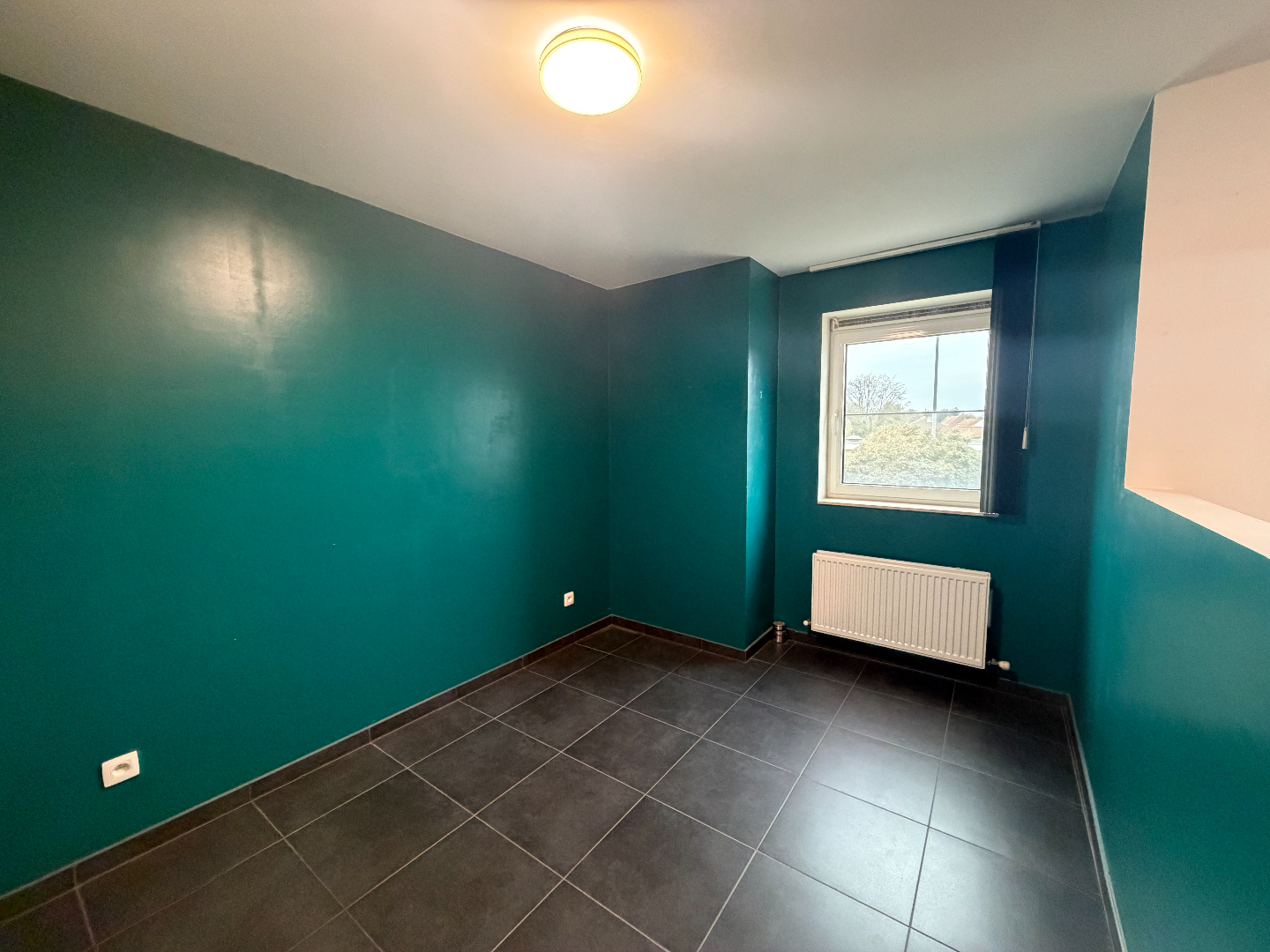 Gezellige studio met autostaanplaats nabij centrum Geel te huur 